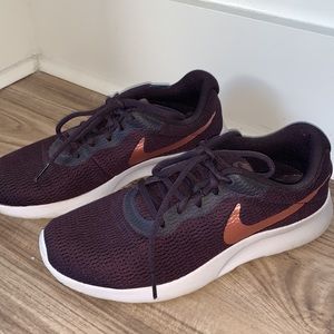 Nike Sneakers gently used size 8- Wine color w/ rose gold Nike check
